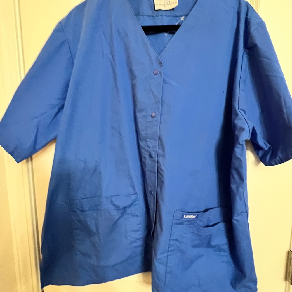 Landau Essentials Relaxed Fit 4-Pocket
V-Neck Scrub Top for Women